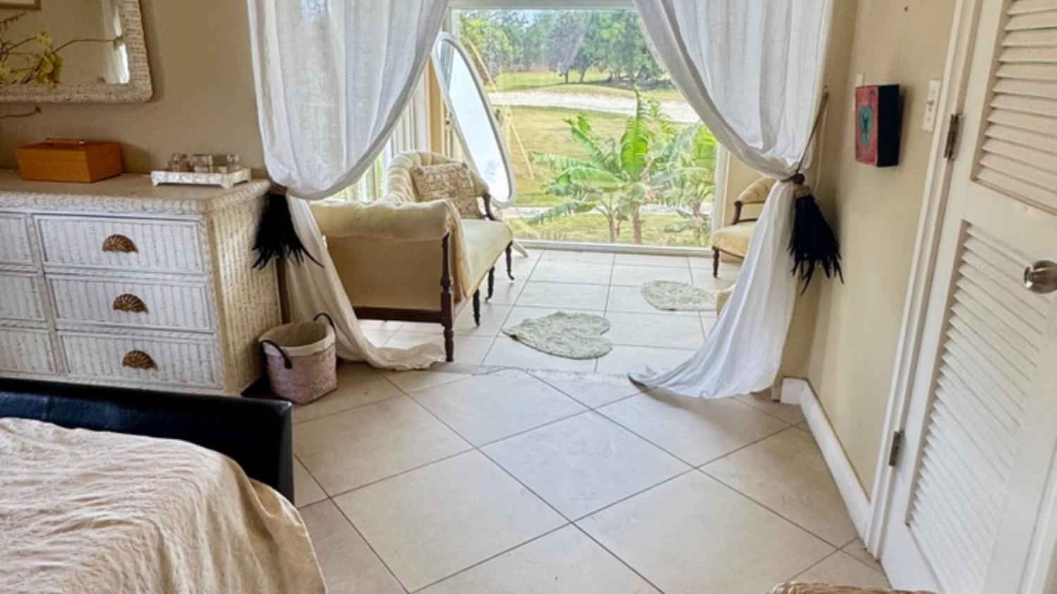 Paradise Properties - Jolly Harbour #318 - The Yellow House 